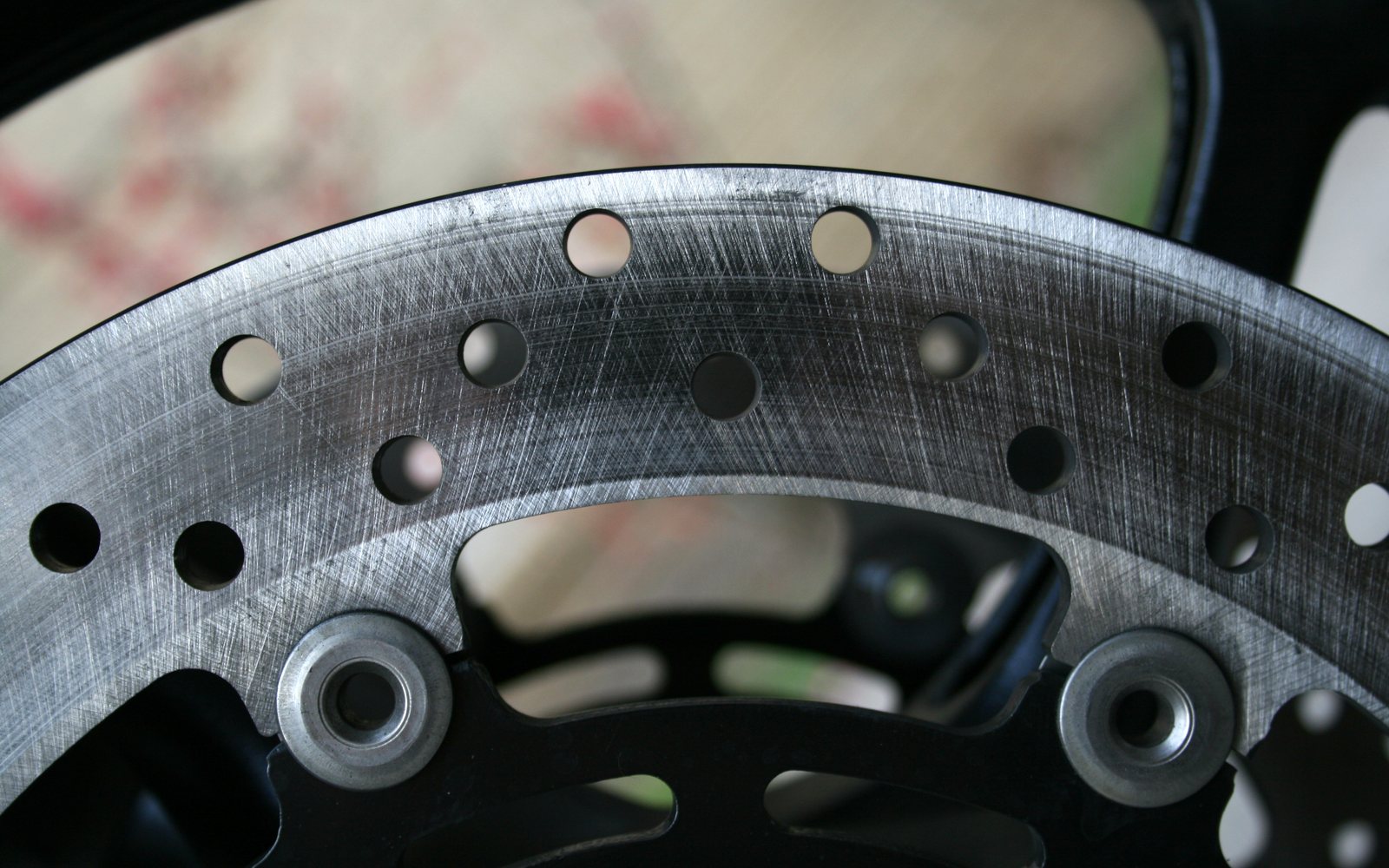 Brake rotor and pad replacement in a driveway