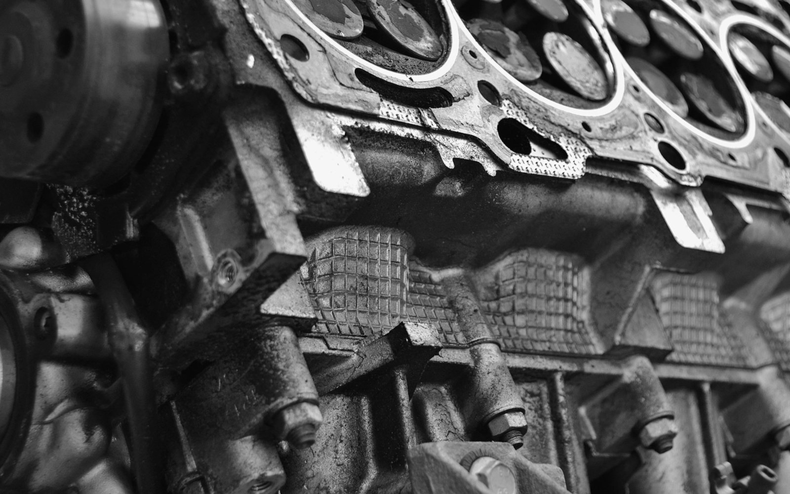 Fresh motor oil poured into an engine